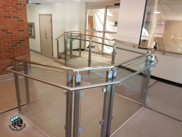 Glass railings on accessibility ramp
