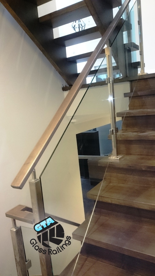 stainless steel railing with wood handrail