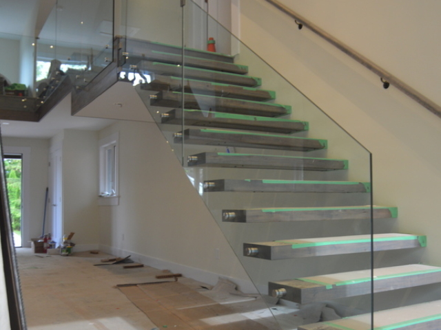 glass railing on floating stairs